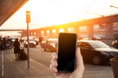 Blur image of international airport terminal taxi and uber pick up location