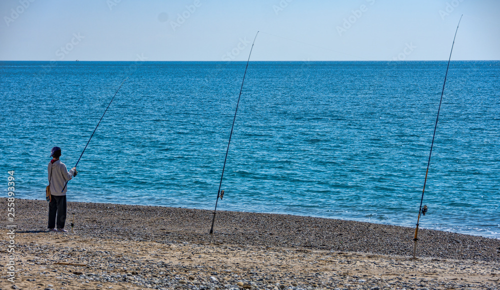 Fisherman on the beach