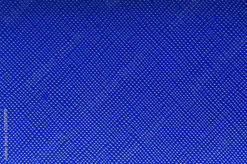 Deep blue artificial leatherette for texture background.
