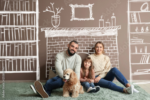 Happy family and cute dog o...