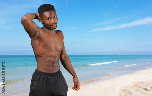 Enjoying healthy lifestyle. Young muscular African man