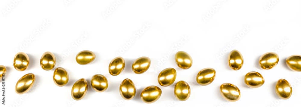 panorama of golden easter eggs, isolated with white background panorama of golden easter eggs, isolated with white background