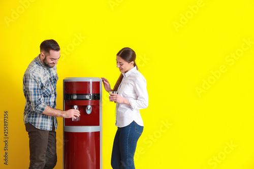 Man and woman drinking wate...
