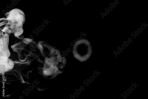 white circle smoke, abstract powder, water spray. isolated on black background.