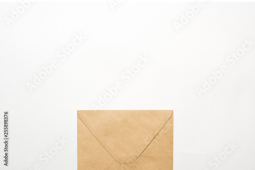 Brown paper envelope document on white background. Copy space