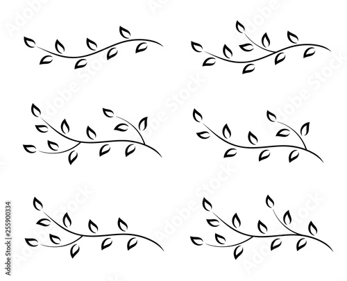 set of black hand drawn tree branches with leaves
