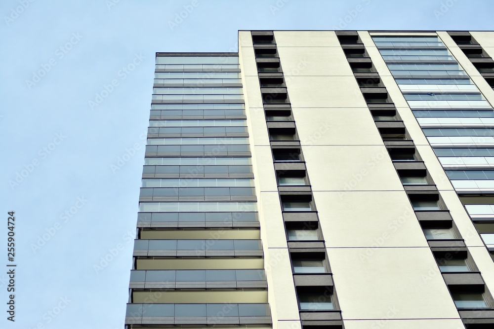 Multistory new modern apartment building. Stylish living block of flats. Multistory new modern apartment building. Stylish living block of flats.