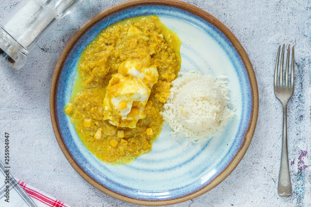 Haddock in creamed coconut and corn curry with rice Haddock in creamed coconut and corn curry with rice