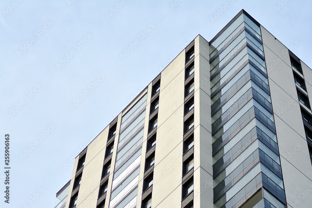 Multistory new modern apartment building. Stylish living block of flats. Multistory new modern apartment building. Stylish living block of flats.