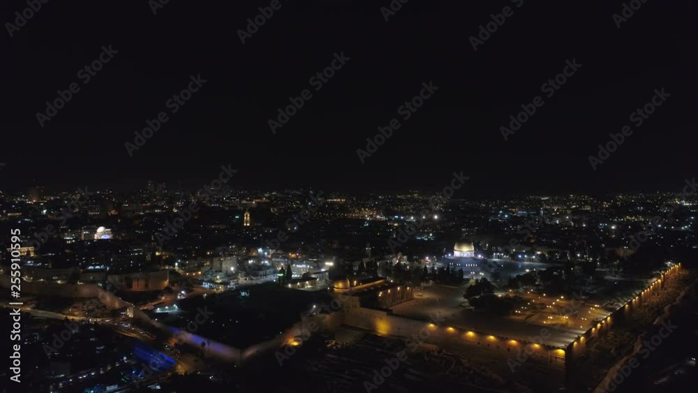 Dolly Night Aerial Shot of the old city in Jerusalem and the Al Aksa Mosque