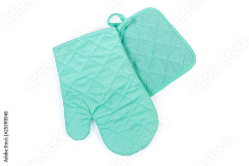 Set of oven glove and pot-holder on white background