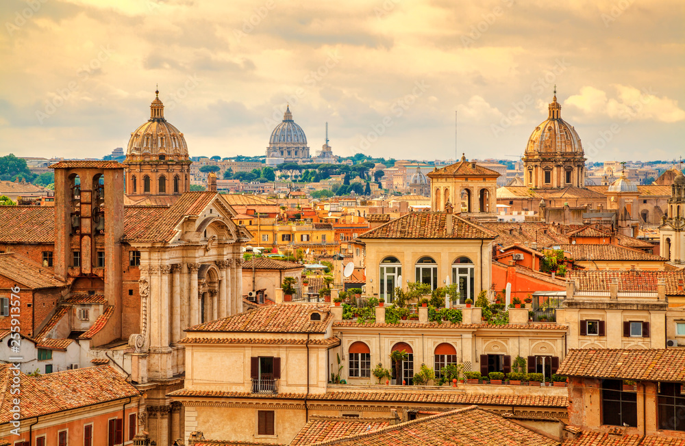Aerial panoramic cityscape of Rome, Italy, Europe. Roma is the capital of Italy. Cityscape of Rome in summer. Rome roofs view with ancient architecture in Italy. Rome architecture and landmark.