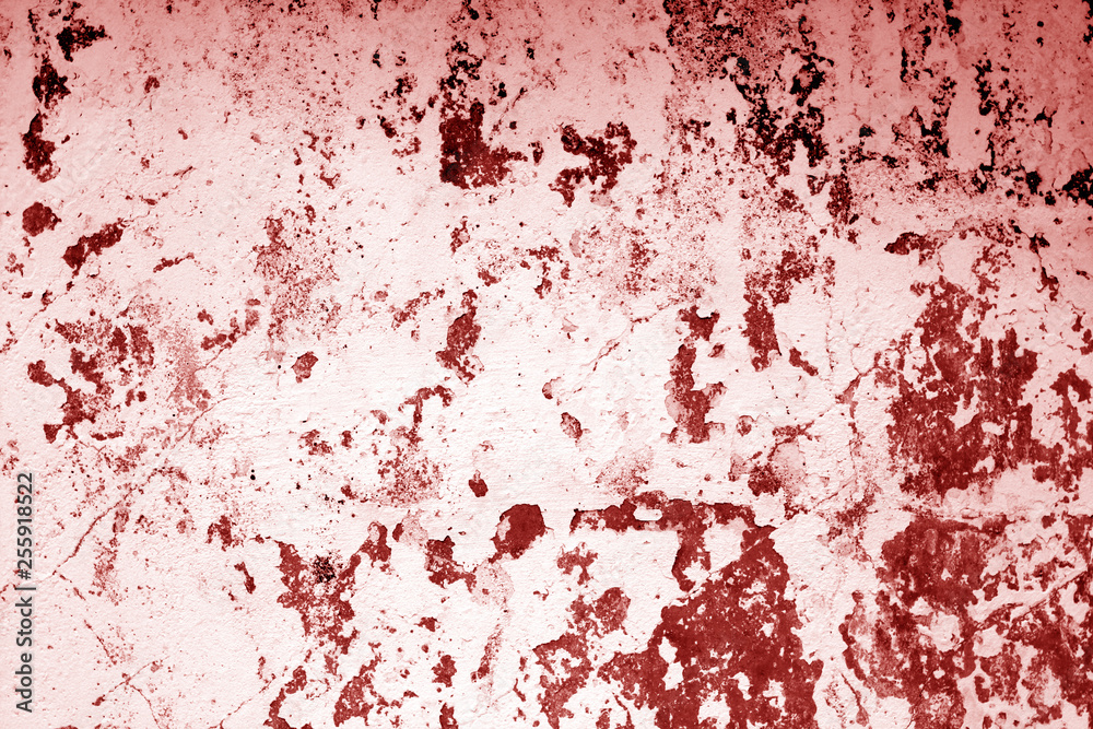 Сraked weathered cement wall texture in red tone. Сraked weathered cement wall texture in red tone.
