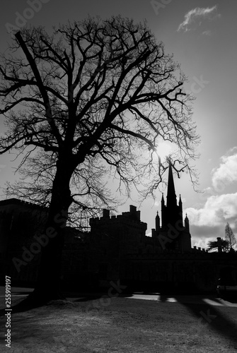 English country house and church in silhouette photo