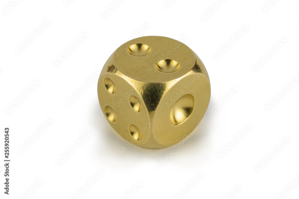 One golden dice isolated on white background.Two, view with shadow. One golden dice isolated on white background.Two, view with shadow.