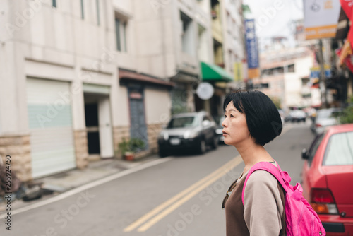 walking Asian traveling woman © ChenPG