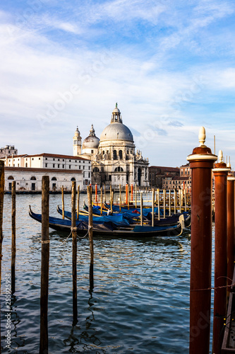 Empty gondolas floating on a lagoon of Venice, Italy