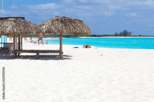 People on the beach. White sand and turquoise sea.  Island Cayo Largo. Cuba.