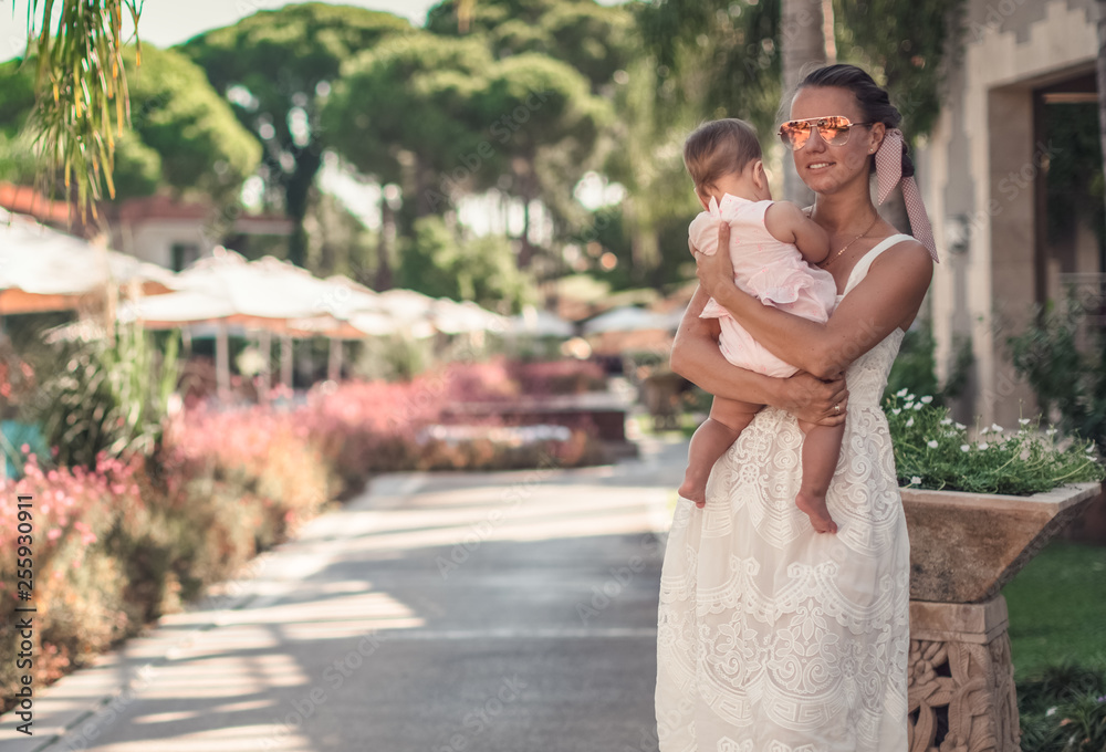 Fototapeta premium woman holding daughter
