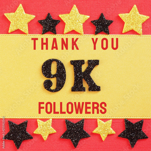 Thanks 9K, 9000 followers. message with black shiny numbers on red and gold background with black and golden shiny stars for social network friends, followers,.likes. photo