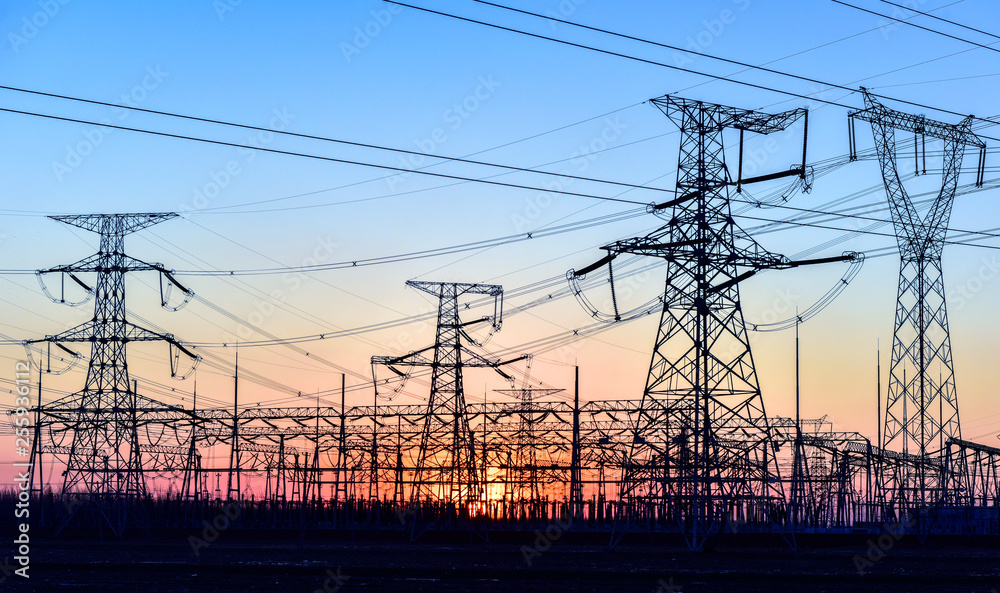 Fototapeta premium Contour of Transmission Tower at Sunset