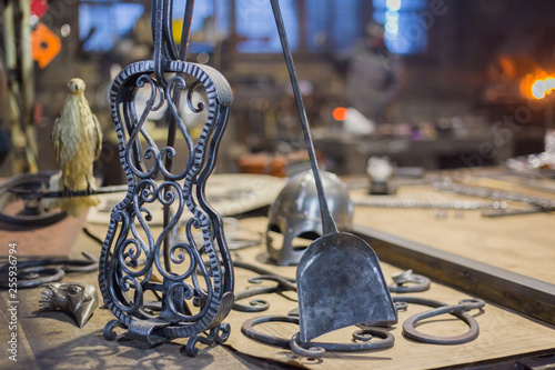 Blacksmith decorative elements at forge, workshop. Handmade, craftsmanship and blacksmithing concept