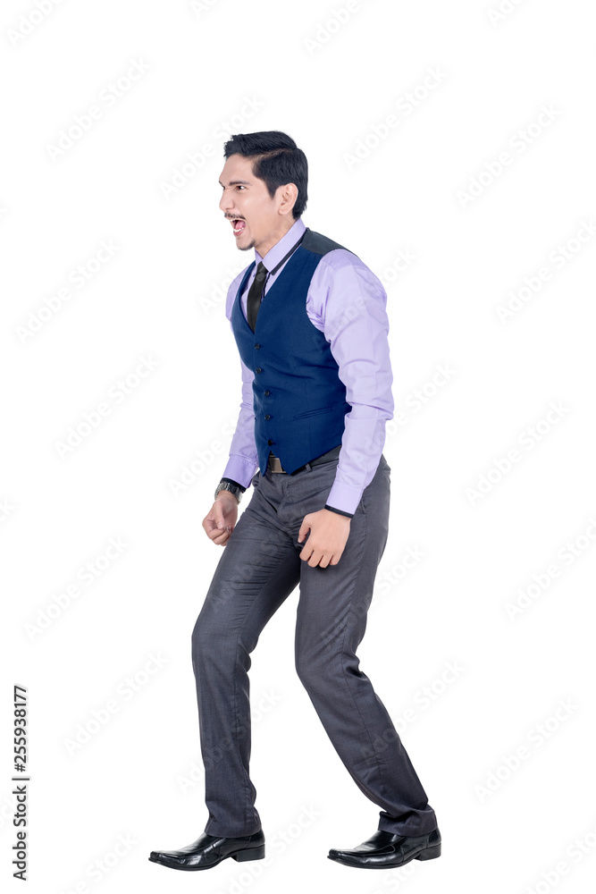 Expressive asian businessman in formal suit standing Expressive asian businessman in formal suit standing