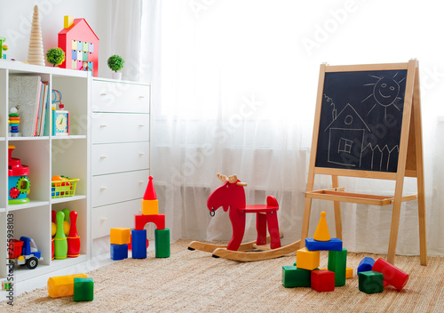 Slika na platnu Children's playroom with plastic colorful educational blocks toys