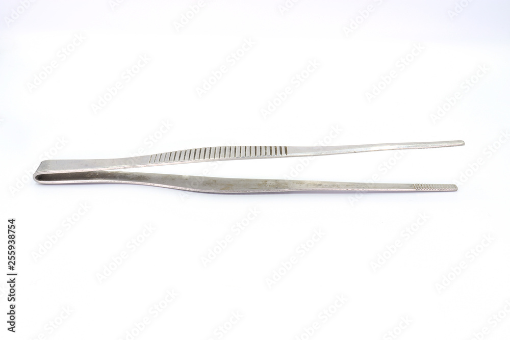 Closeup of dirty medical pincette isolated on white background. Closeup of dirty medical pincette isolated on white background.