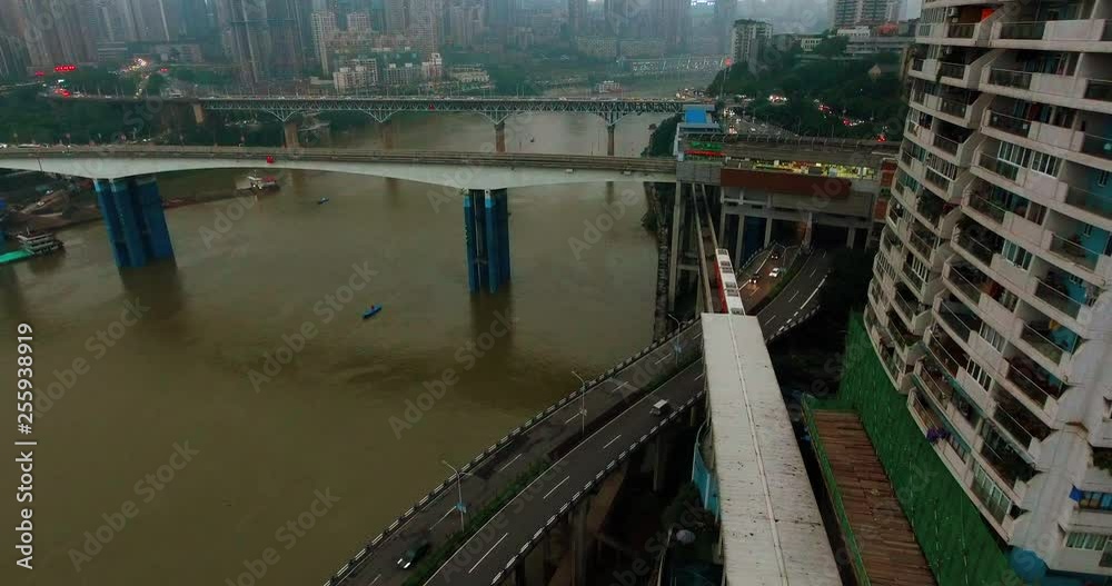 Aerial view of a cable-stayed bridge spanning the Yangtze river in Chongqing, China. D-log profile DJI Phantom. Aerial view of a cable-stayed bridge spanning the Yangtze river in Chongqing, China. D-log profile DJI Phantom.