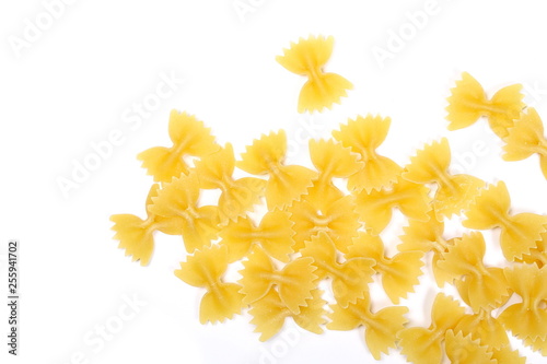Farfalle pasta pile isolated on white background