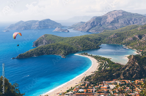 Fototapeta Naklejka Na Ścianę i Meble -  Aerial view of paraglider and Blue Lagoon in Oludeniz, Turkey.