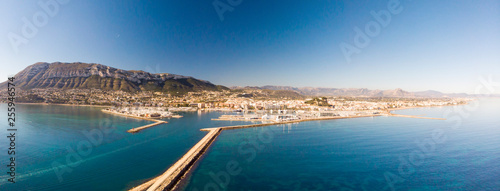 Aerial view of Denia port. The city and Montgo and Segaria mountains are in the background.