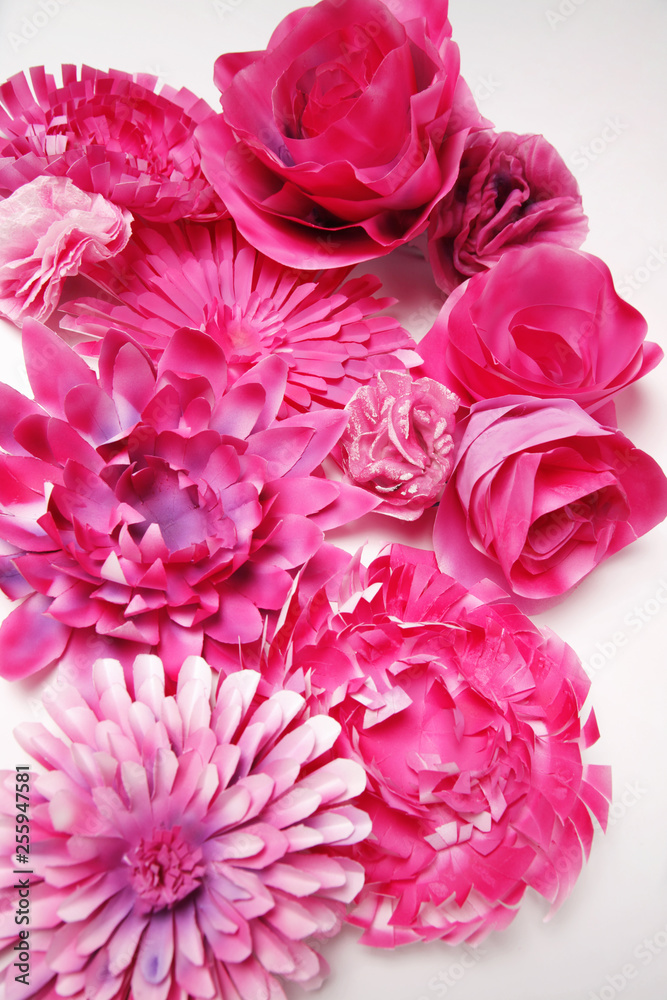 Pile of purple flowers isolated on white background, closeup shot Pile of purple flowers isolated on white background, closeup shot