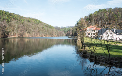  View on Old decaying hotel at beatiful lake in Czech Republic (Harasov). photo