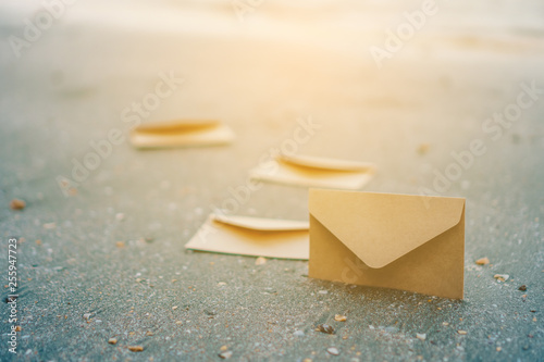many od envelope imply for sending mail on sand texture background.