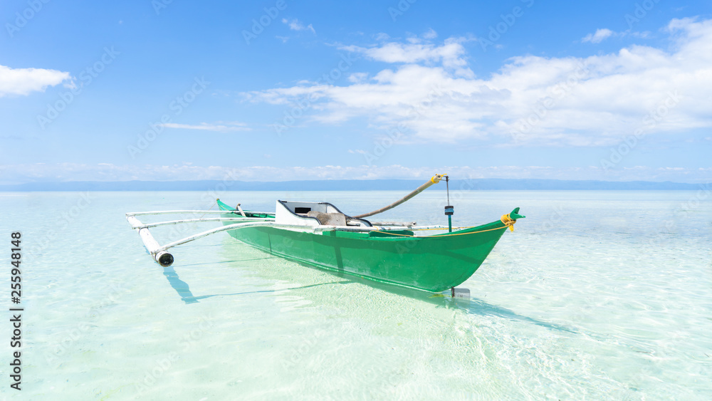 Side On Angle of A Traditional Filipino Fishing Boat Resting In