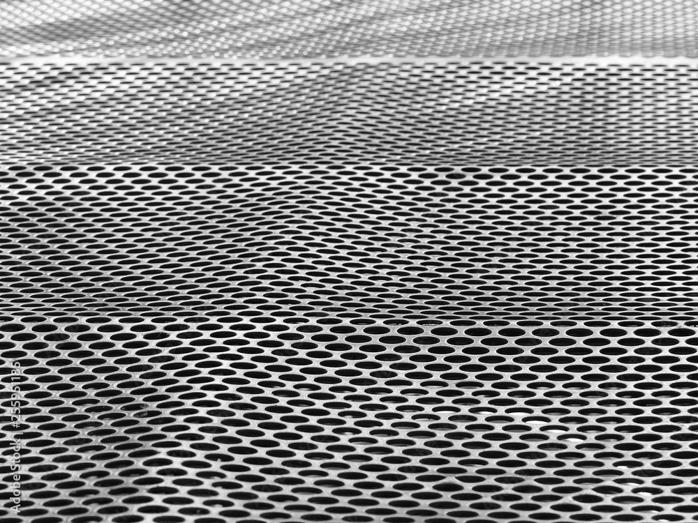 Perforated sheet metal chrome with light and shadow Perforated sheet metal chrome with light and shadow