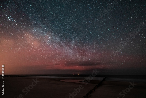 view of the milkyway from the beach photo