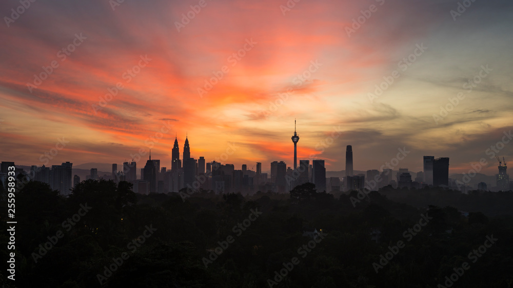 KUALA LUMPUR, MALAYSIA - DECEMBER 22, 2018: Kuala Lumpur city skyline at sunrise with colourful skies.