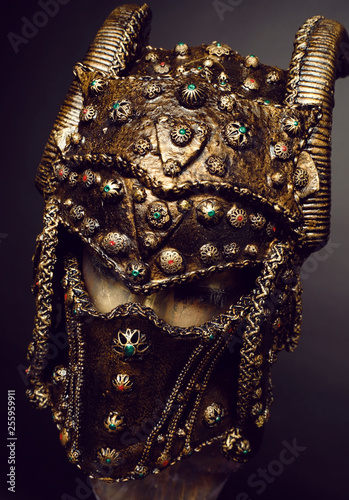 Mannequin in dark bronze helmet