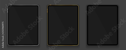 New design of gold, silver and black tablets in trendy thin frame style with shadow isolated on grey background. Empty screen concept. Vector illustration