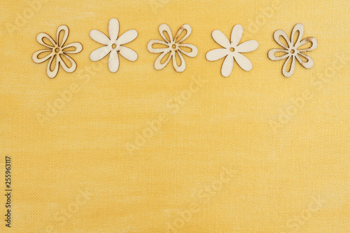 Wood flower petals on hand painted distressed gold background