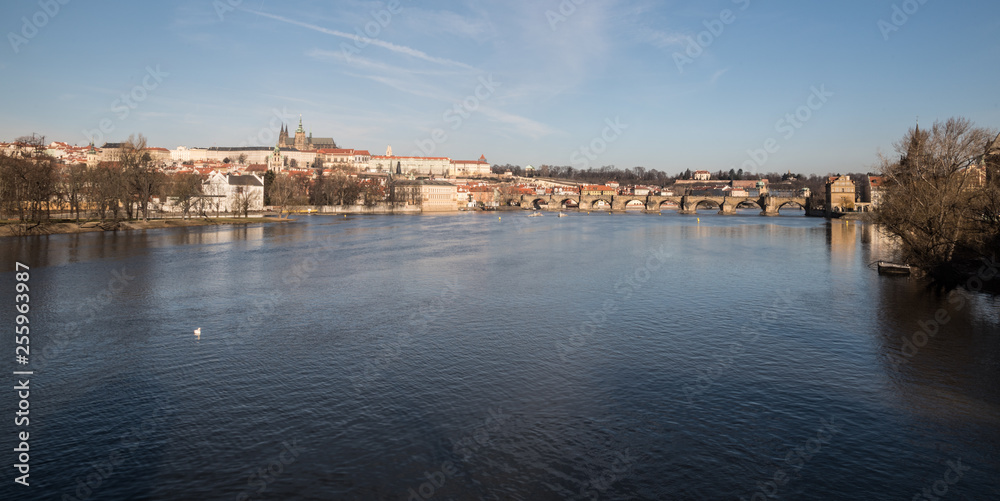 Vltava river, Karluv most bridge and Hradcany with Prazsky hrad castle in Prague city in Czech republic