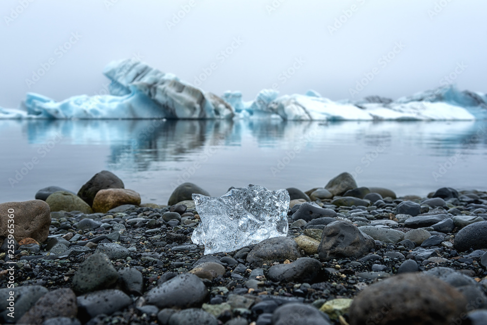 Blue ice of the Jokulsarlon Glacier Lagoon, amazing nature of Iceland, popular tourist attraction Blue ice of the Jokulsarlon Glacier Lagoon, amazing nature of Iceland, popular tourist attraction