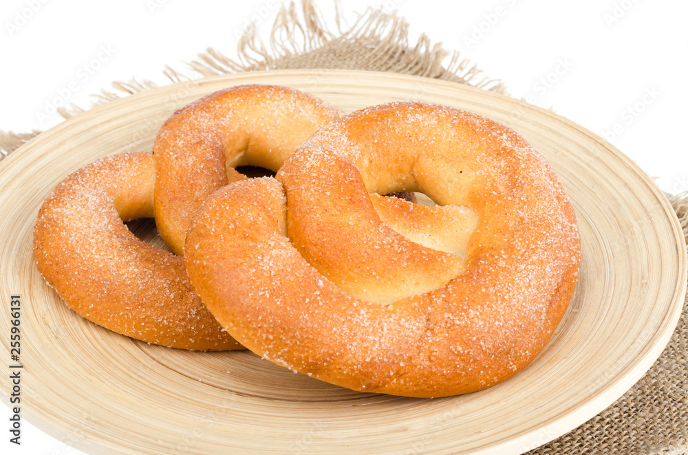 Delicious sweet pastries homemade pretzel with sugar. Delicious sweet pastries homemade pretzel with sugar.