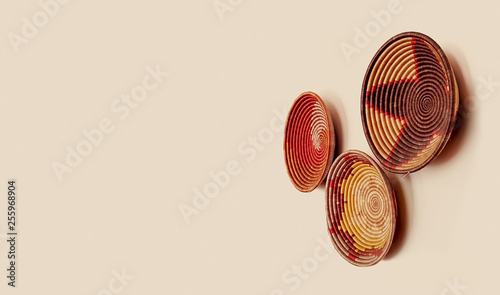 Woven decorative baskets hanging on a wall; african home decor items