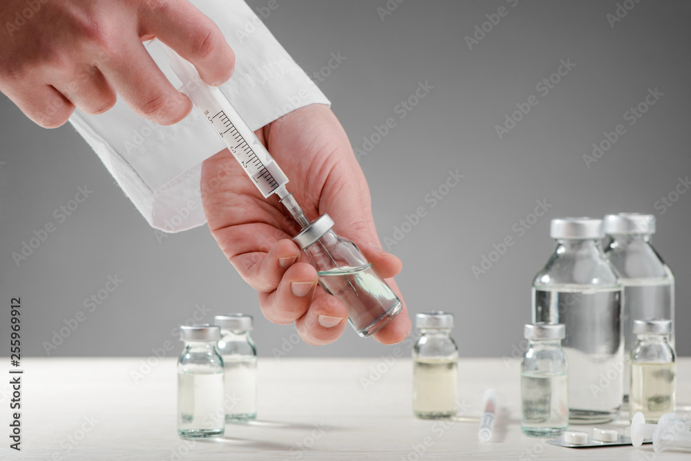 Drawing medicine out of vial Drawing medicine out of vial