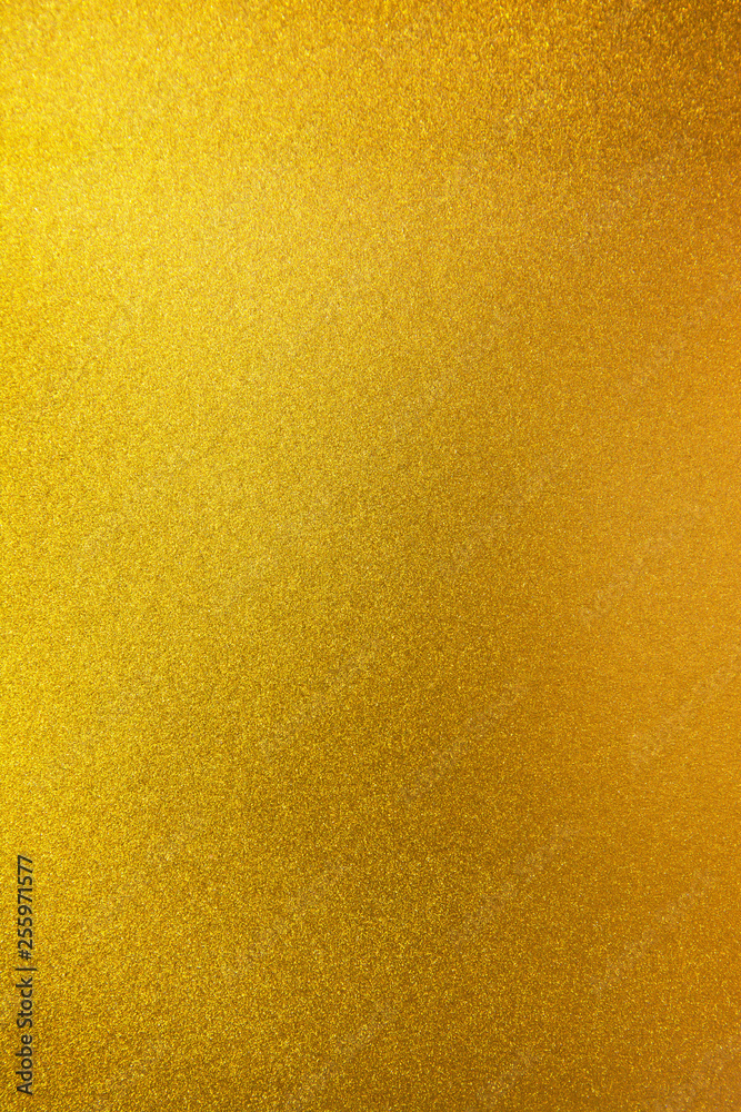 Vertical gold texture background. Vertical smooth gold texture surface Vertical gold texture background. Vertical smooth gold texture surface