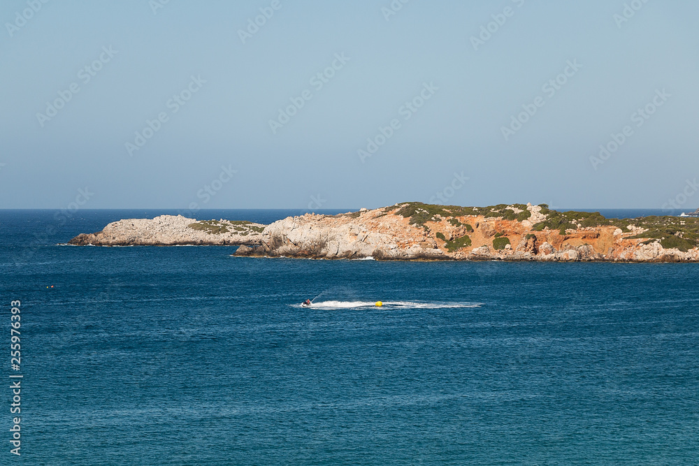 Jet ski on the sea with a man.
